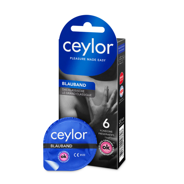 Product photo of a Ceylor 'Blauband' (Blue Band) condom box containing 6 pieces, standing next to a single opened round foil packet. The packaging is dark blue and black with white text.