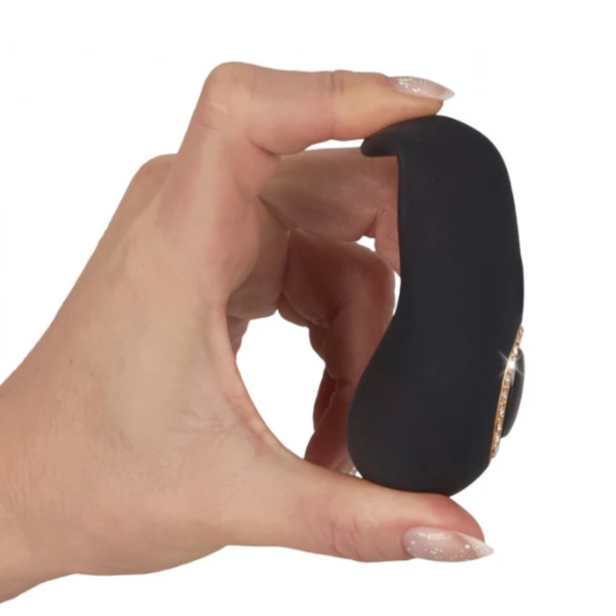 Close-up of a hand demonstrating the flexibility of the matte black clitoral massager by gently bending its curved tip.