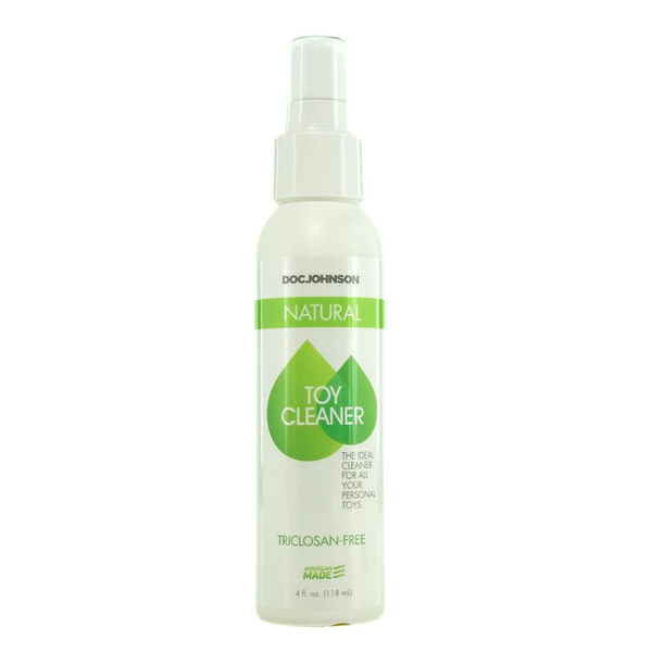 Front studio shot of the 4 fl oz (118 ml) white spray bottle of Doc Johnson Natural Toy Cleaner with a green leaf design emblem and clear spray nozzle.