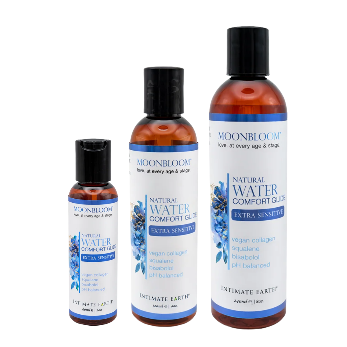 Size comparison view showing three amber bottles of Intimate Earth Moon Bloom water comfort glide standing side by side in 60 ml (2 fl oz), 120 ml (4 fl oz), and 240 ml (8 fl oz) capacities. Hauptbild