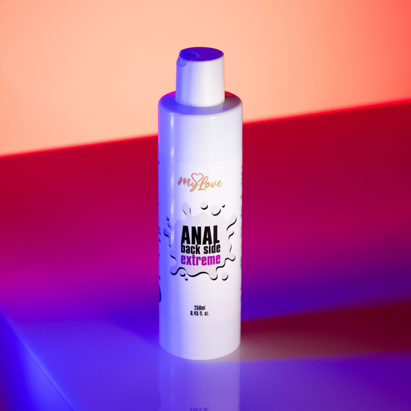 Front view of the 250 ml MyLove Anal Back Side Extreme bottle illuminated under vibrant pink and blue studio lighting.