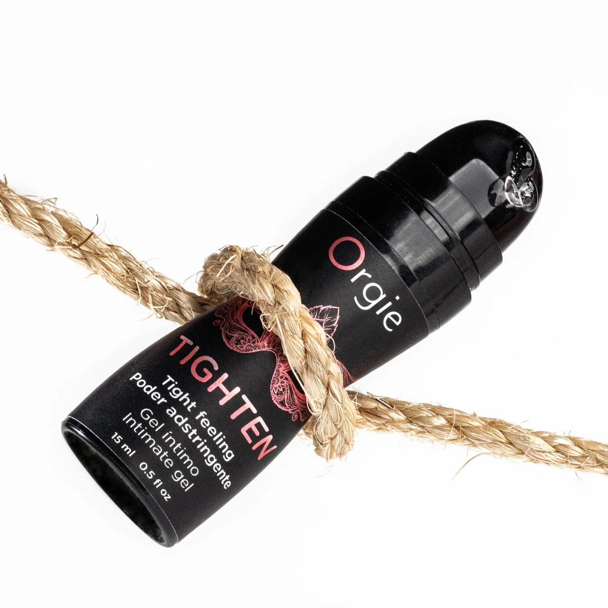 The small black pump bottle of Orgie Tighten intimate gel tied tightly with a thick natural rope, symbolizing the product's effect.