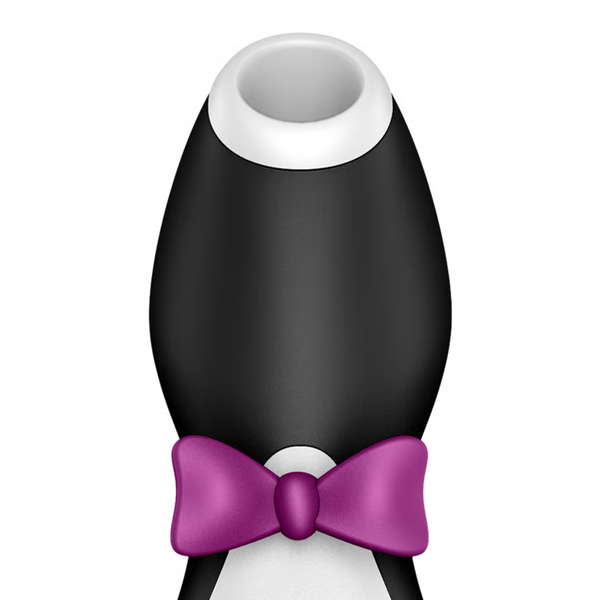 Front close-up view focusing on the upper portion of the Satisfyer Penguin massager, showing its white silicone stimulation nozzle and purple bow tie details.