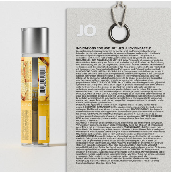 The back label of a System JO H2O Juicy Pineapple bottle shown next to a matching card with detailed "Indications for Use" text. The panel outlines instructions, warnings, and ingredients.