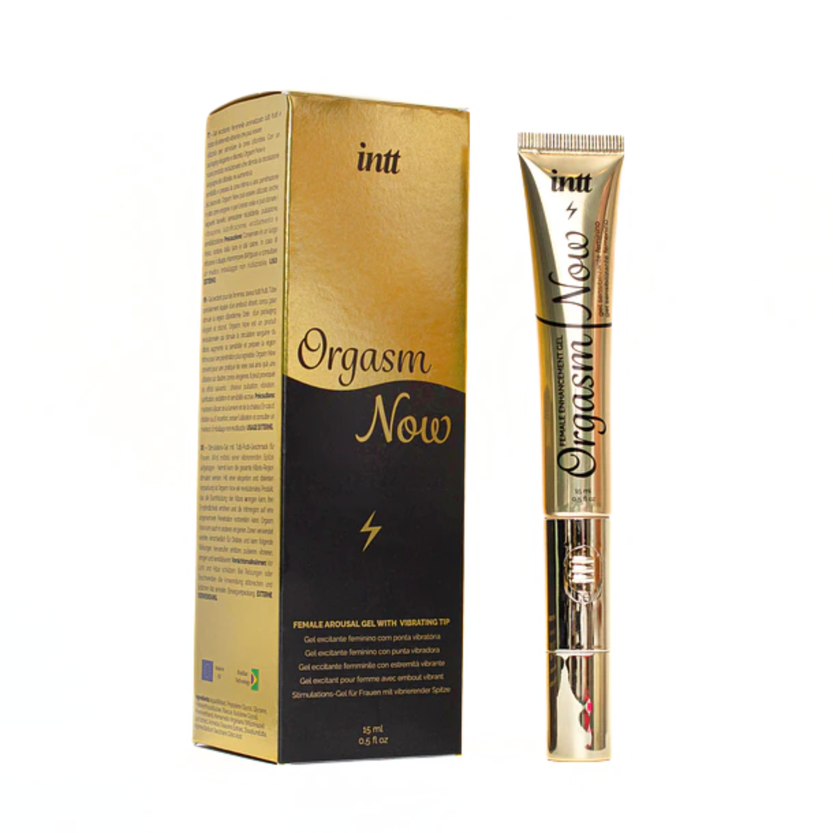 Intt Orgasm Now female arousal gel in a 0.5 fl oz (15 ml) gold tube with a vibrating tip, standing vertically next to its black and gold retail packaging box on a plain white background. Hauptbild