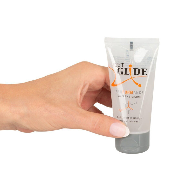 Woman hand holding Just Glide Performance 50ml Tube Lubricant